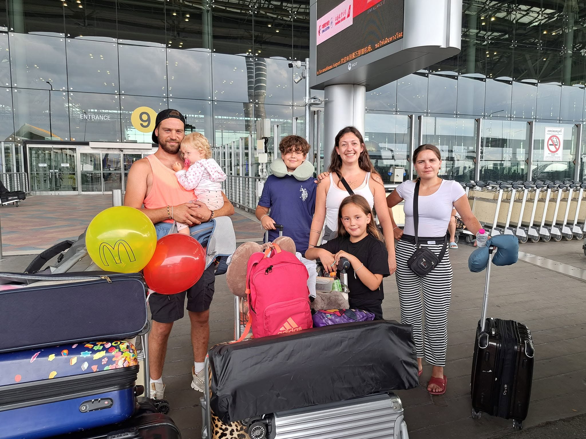 Family arriving at Suvarnabhumi with John Taxi